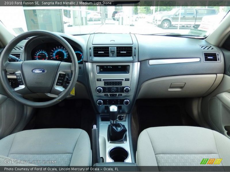 Sangria Red Metallic / Medium Light Stone 2010 Ford Fusion SE