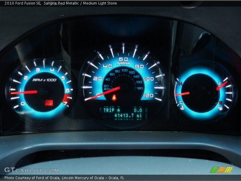 Sangria Red Metallic / Medium Light Stone 2010 Ford Fusion SE