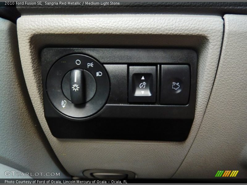Sangria Red Metallic / Medium Light Stone 2010 Ford Fusion SE