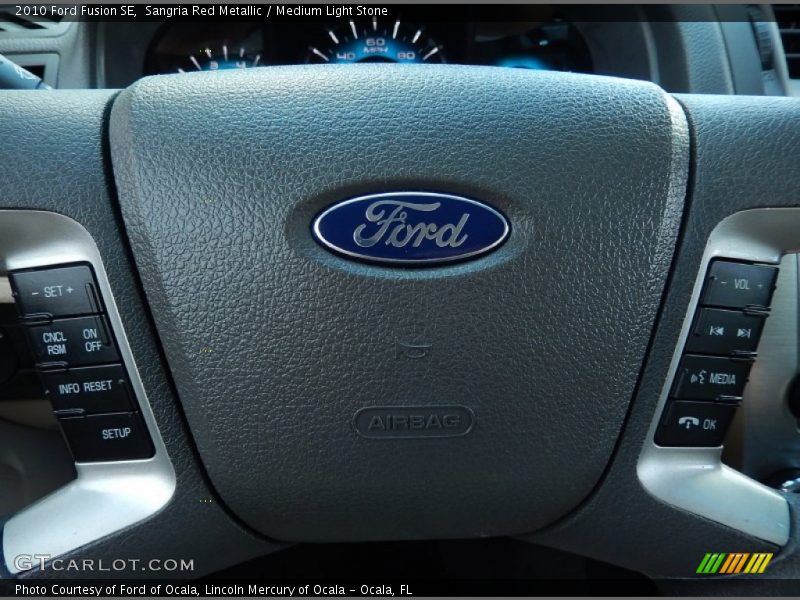 Sangria Red Metallic / Medium Light Stone 2010 Ford Fusion SE