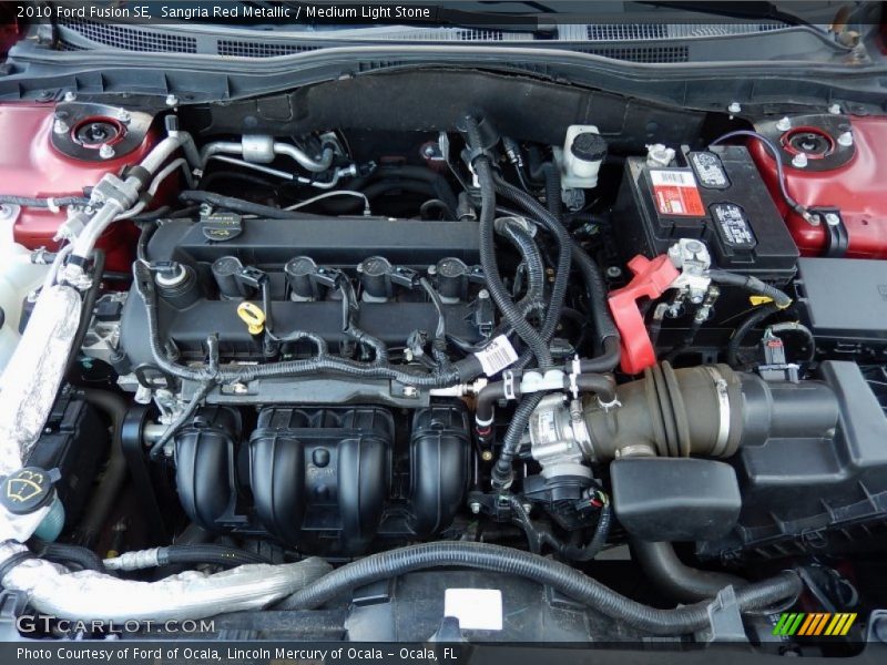 Sangria Red Metallic / Medium Light Stone 2010 Ford Fusion SE