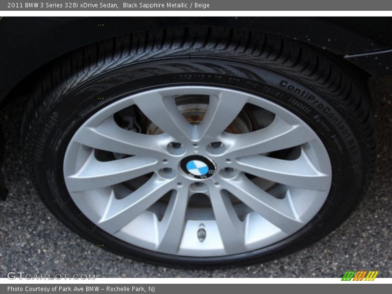 Black Sapphire Metallic / Beige 2011 BMW 3 Series 328i xDrive Sedan