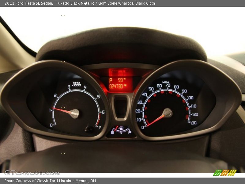 Tuxedo Black Metallic / Light Stone/Charcoal Black Cloth 2011 Ford Fiesta SE Sedan