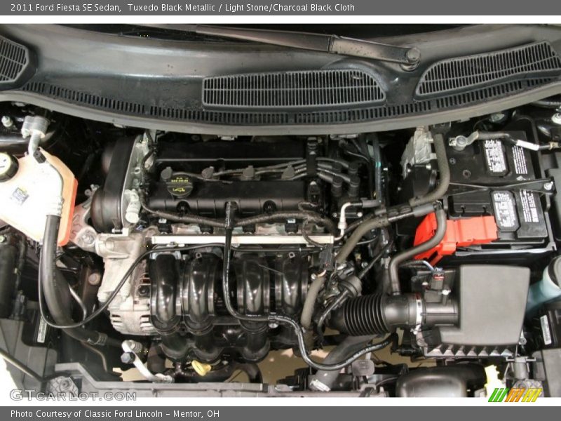 Tuxedo Black Metallic / Light Stone/Charcoal Black Cloth 2011 Ford Fiesta SE Sedan