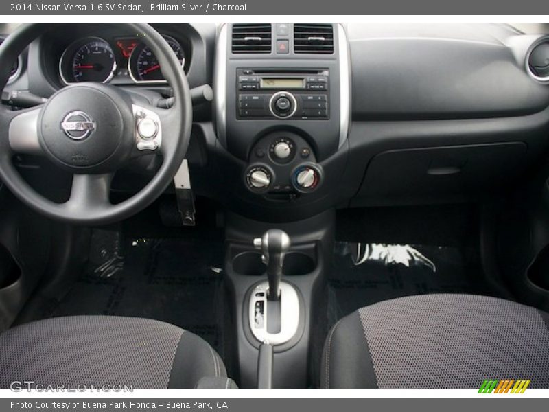 Brilliant Silver / Charcoal 2014 Nissan Versa 1.6 SV Sedan
