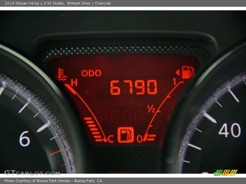 Brilliant Silver / Charcoal 2014 Nissan Versa 1.6 SV Sedan