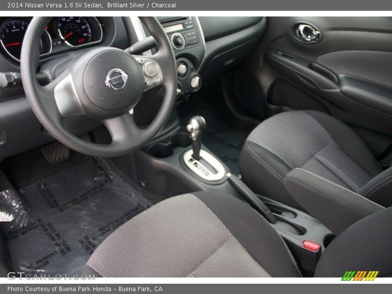 Brilliant Silver / Charcoal 2014 Nissan Versa 1.6 SV Sedan