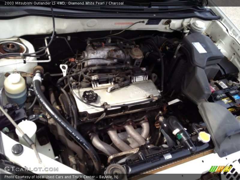 Diamond White Pearl / Charcoal 2003 Mitsubishi Outlander LS 4WD