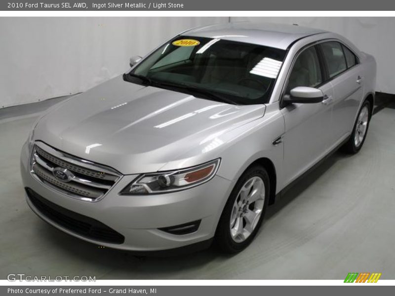 Ingot Silver Metallic / Light Stone 2010 Ford Taurus SEL AWD