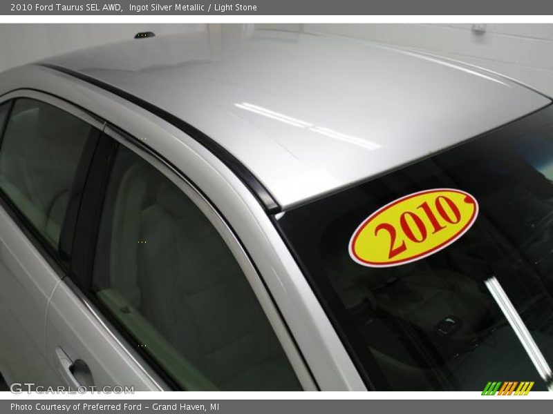 Ingot Silver Metallic / Light Stone 2010 Ford Taurus SEL AWD