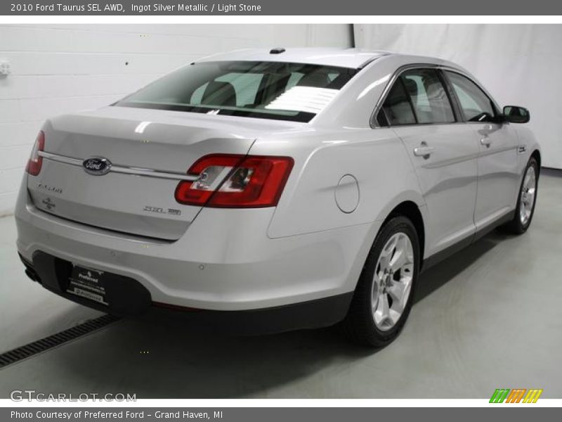 Ingot Silver Metallic / Light Stone 2010 Ford Taurus SEL AWD