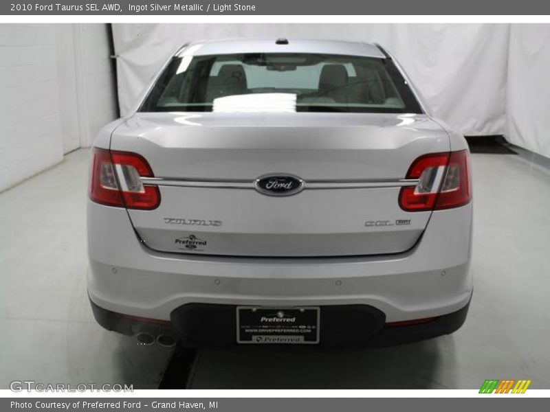 Ingot Silver Metallic / Light Stone 2010 Ford Taurus SEL AWD