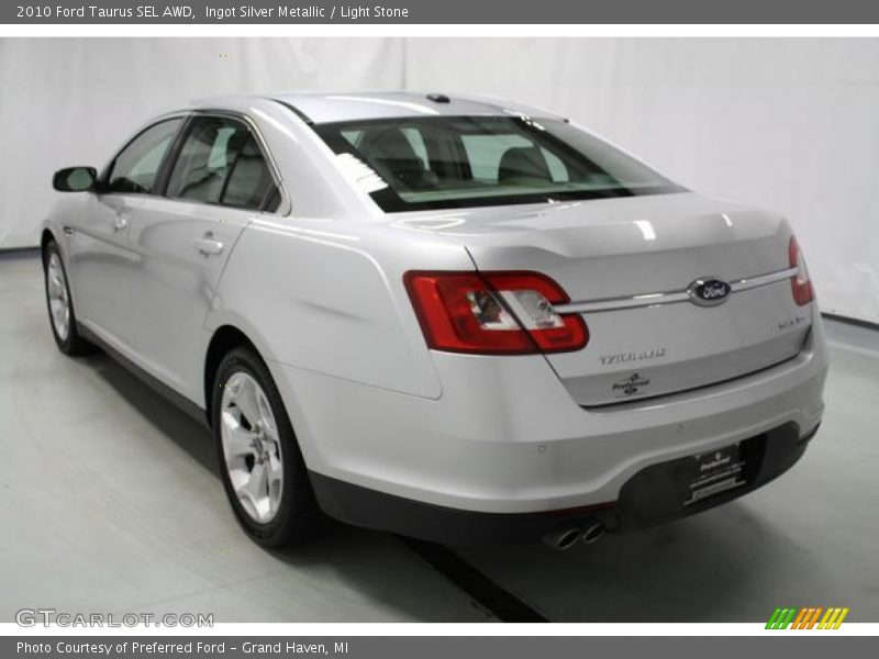 Ingot Silver Metallic / Light Stone 2010 Ford Taurus SEL AWD