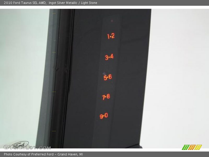 Ingot Silver Metallic / Light Stone 2010 Ford Taurus SEL AWD