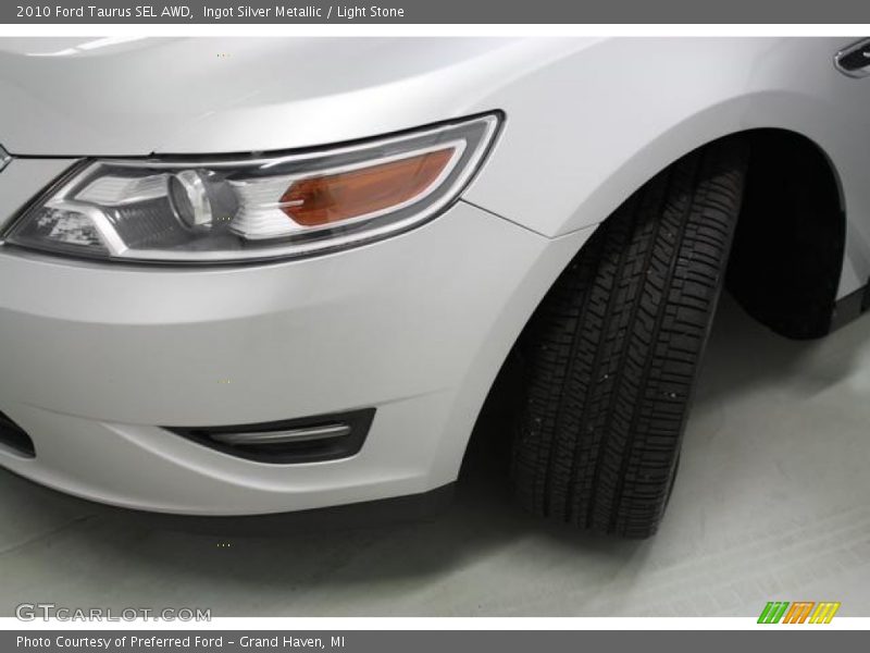Ingot Silver Metallic / Light Stone 2010 Ford Taurus SEL AWD