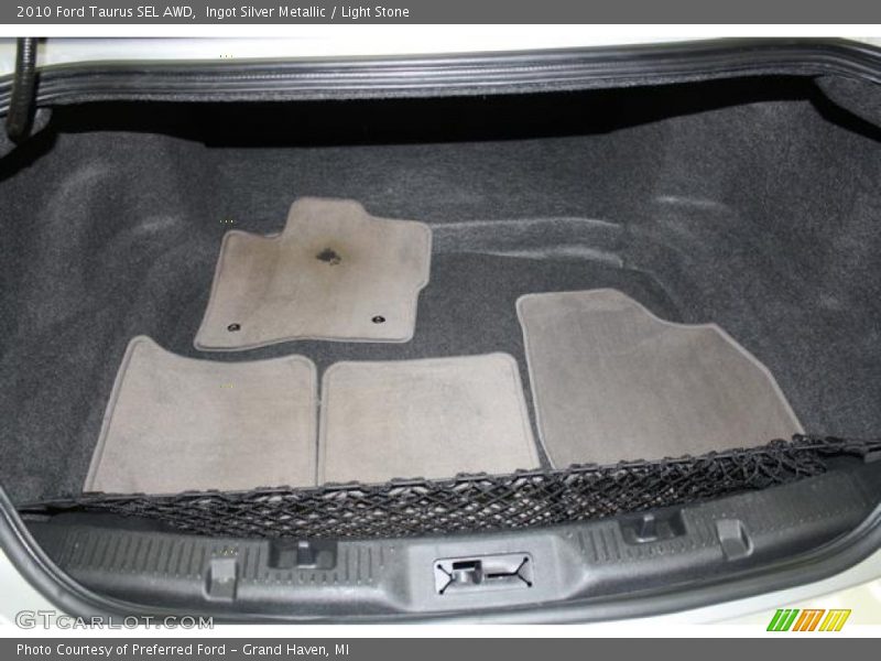 Ingot Silver Metallic / Light Stone 2010 Ford Taurus SEL AWD