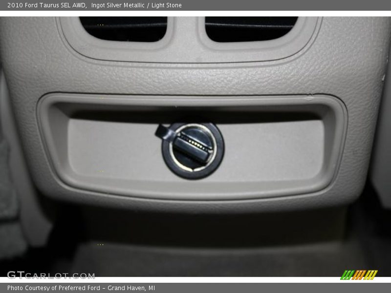 Ingot Silver Metallic / Light Stone 2010 Ford Taurus SEL AWD