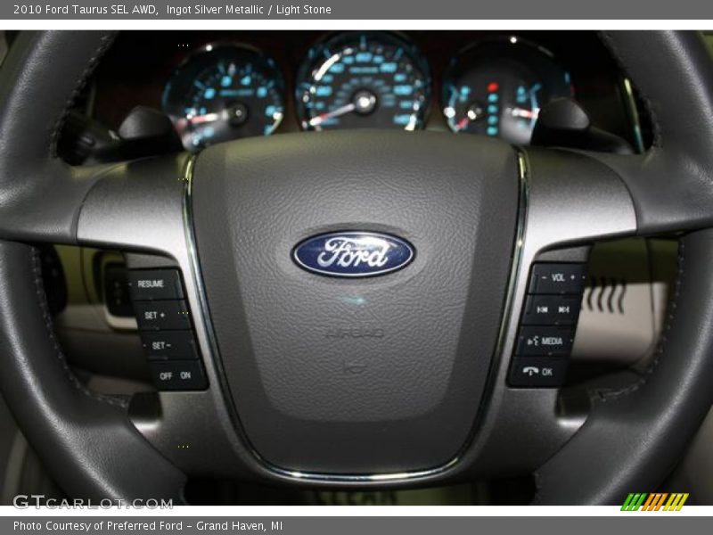 Ingot Silver Metallic / Light Stone 2010 Ford Taurus SEL AWD