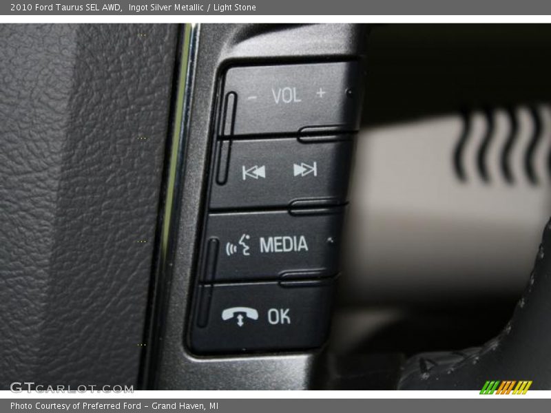Ingot Silver Metallic / Light Stone 2010 Ford Taurus SEL AWD