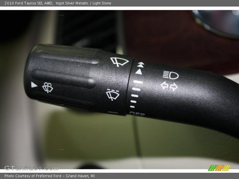Ingot Silver Metallic / Light Stone 2010 Ford Taurus SEL AWD