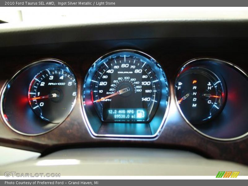 Ingot Silver Metallic / Light Stone 2010 Ford Taurus SEL AWD