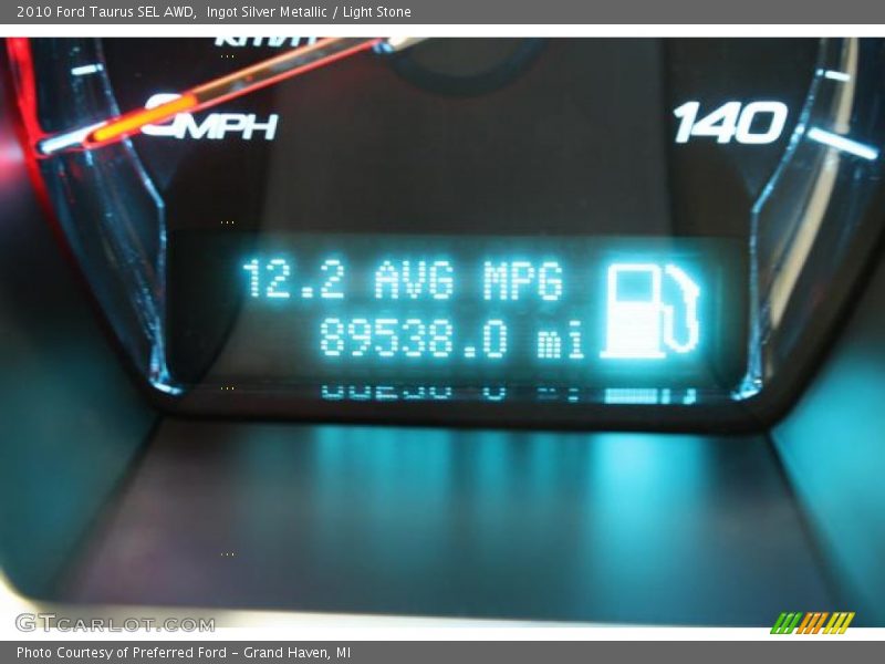 Ingot Silver Metallic / Light Stone 2010 Ford Taurus SEL AWD