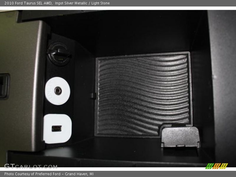 Ingot Silver Metallic / Light Stone 2010 Ford Taurus SEL AWD