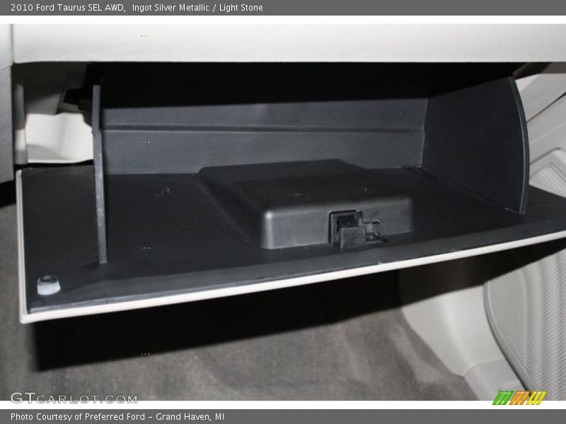 Ingot Silver Metallic / Light Stone 2010 Ford Taurus SEL AWD