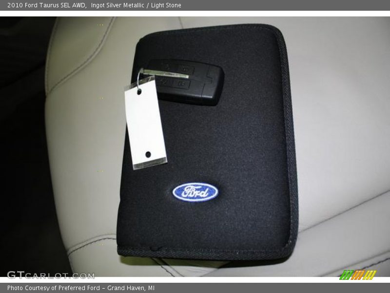 Ingot Silver Metallic / Light Stone 2010 Ford Taurus SEL AWD