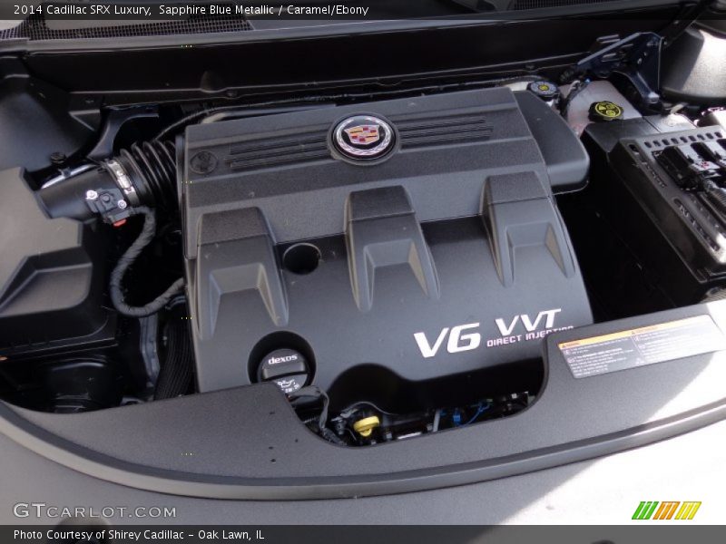 Sapphire Blue Metallic / Caramel/Ebony 2014 Cadillac SRX Luxury