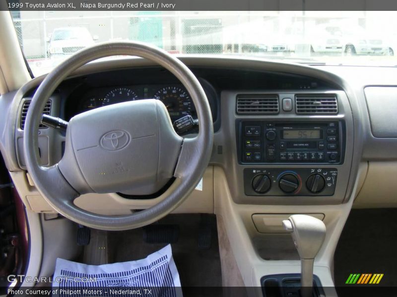 Napa Burgundy Red Pearl / Ivory 1999 Toyota Avalon XL