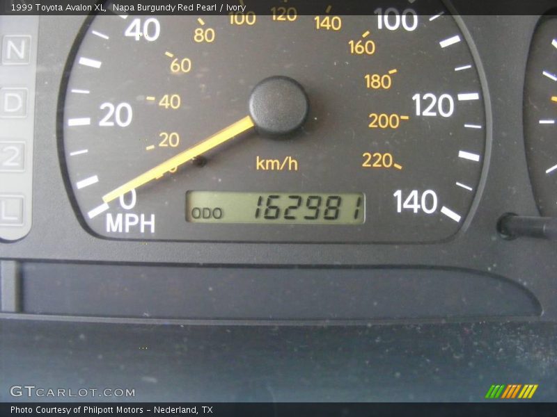 Napa Burgundy Red Pearl / Ivory 1999 Toyota Avalon XL