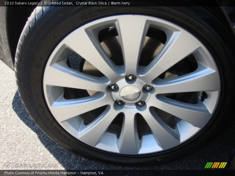 Crystal Black Silica / Warm Ivory 2010 Subaru Legacy 2.5i Limited Sedan