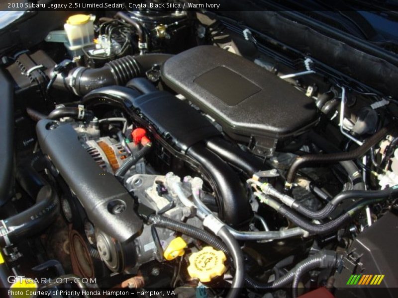 Crystal Black Silica / Warm Ivory 2010 Subaru Legacy 2.5i Limited Sedan