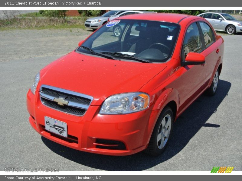 Victory Red / Charcoal 2011 Chevrolet Aveo LT Sedan