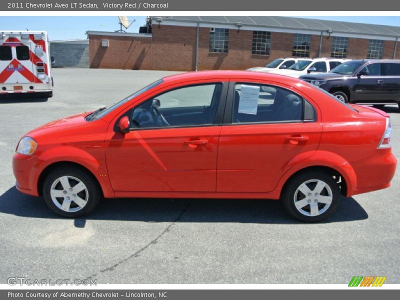 Victory Red / Charcoal 2011 Chevrolet Aveo LT Sedan