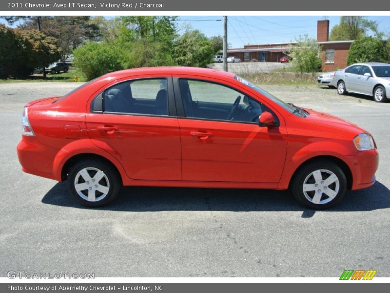 Victory Red / Charcoal 2011 Chevrolet Aveo LT Sedan