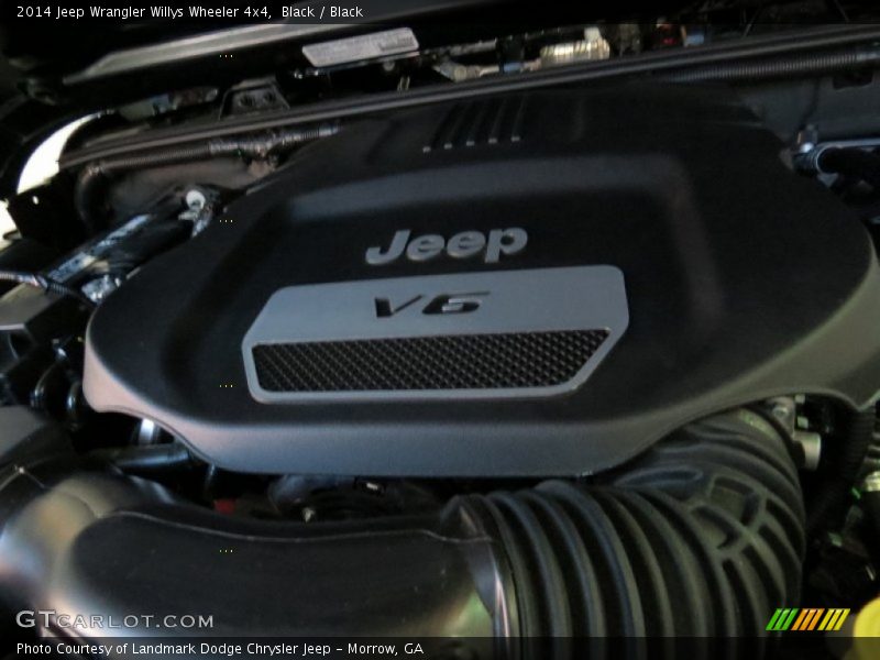 Black / Black 2014 Jeep Wrangler Willys Wheeler 4x4