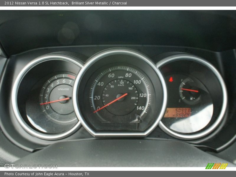Brilliant Silver Metallic / Charcoal 2012 Nissan Versa 1.8 SL Hatchback