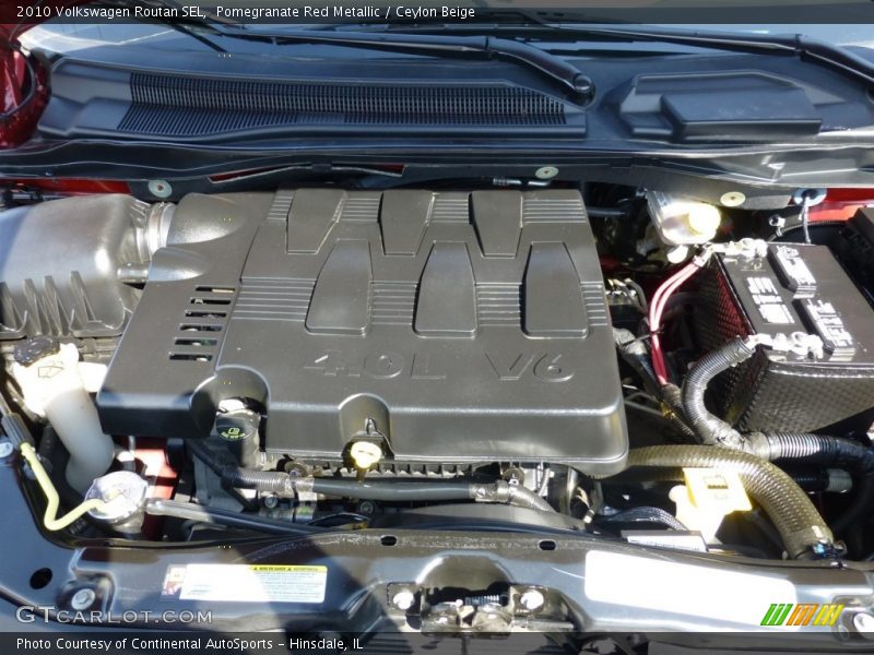 Pomegranate Red Metallic / Ceylon Beige 2010 Volkswagen Routan SEL