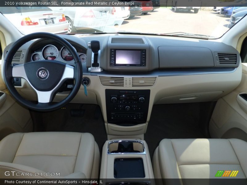 Pomegranate Red Metallic / Ceylon Beige 2010 Volkswagen Routan SEL