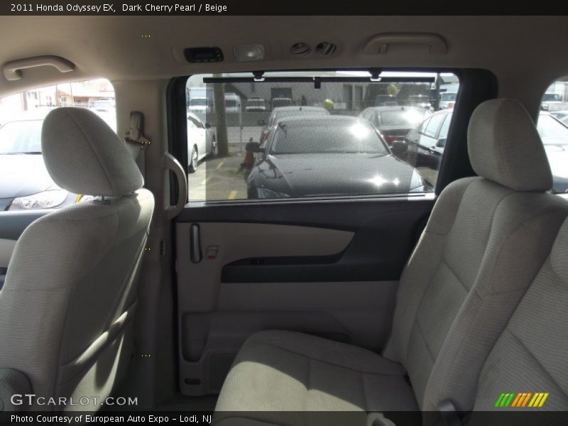 Dark Cherry Pearl / Beige 2011 Honda Odyssey EX