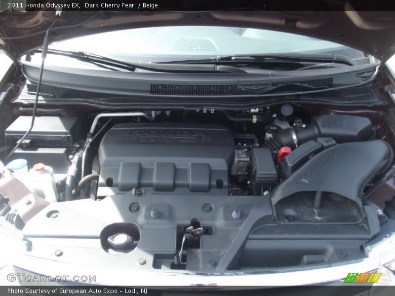 Dark Cherry Pearl / Beige 2011 Honda Odyssey EX