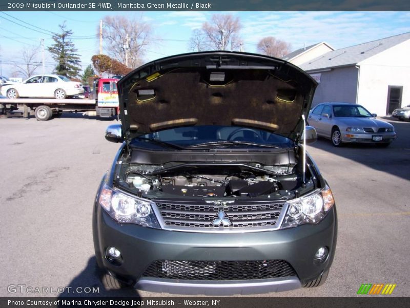 Manitoba Green Metallic / Black 2009 Mitsubishi Outlander SE 4WD