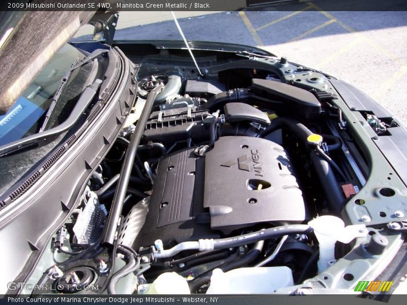 Manitoba Green Metallic / Black 2009 Mitsubishi Outlander SE 4WD