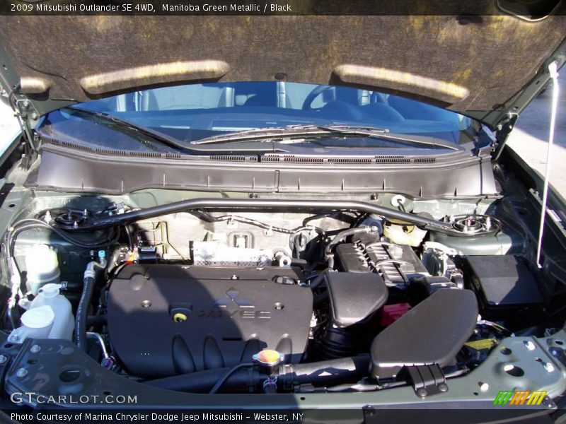 Manitoba Green Metallic / Black 2009 Mitsubishi Outlander SE 4WD