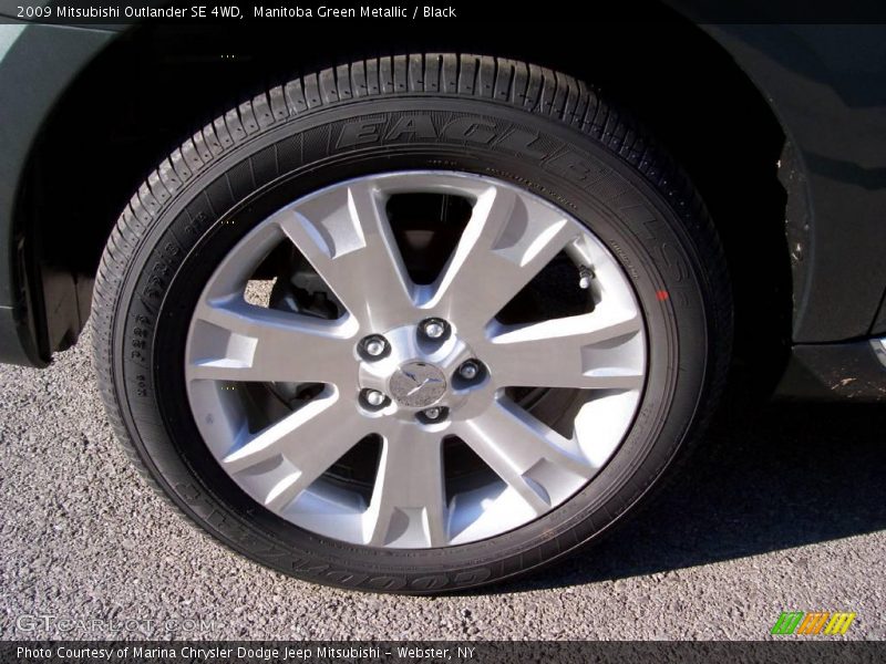 Manitoba Green Metallic / Black 2009 Mitsubishi Outlander SE 4WD