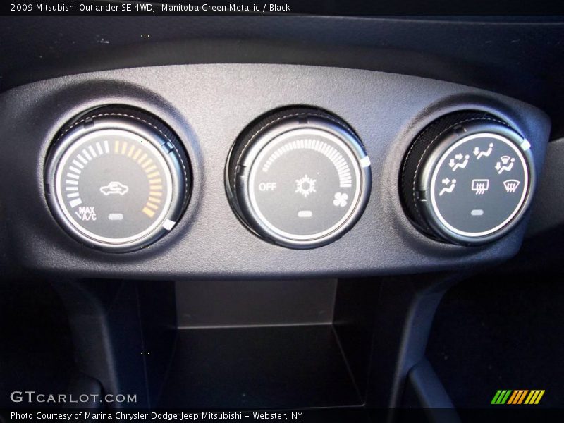 Manitoba Green Metallic / Black 2009 Mitsubishi Outlander SE 4WD