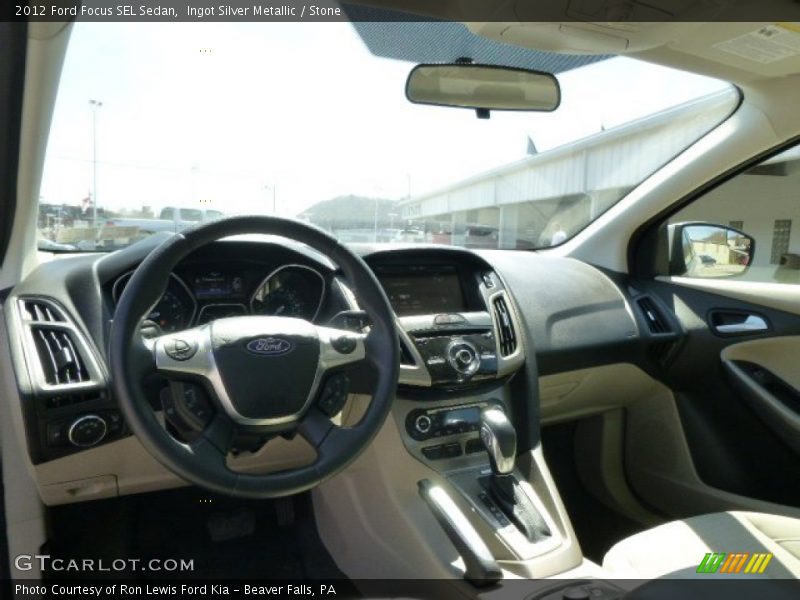 Ingot Silver Metallic / Stone 2012 Ford Focus SEL Sedan