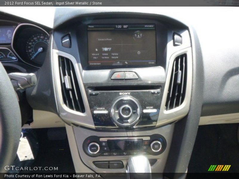 Ingot Silver Metallic / Stone 2012 Ford Focus SEL Sedan